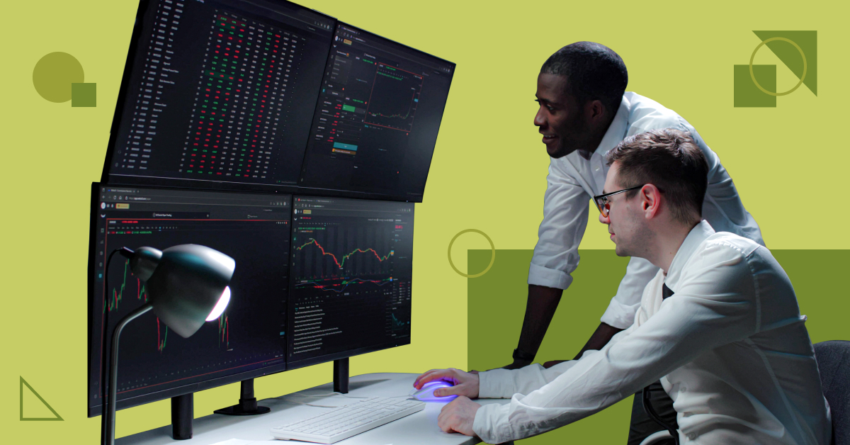 Hero image for Popular cybersecurity courses to advance your career in 2022' blog post. Two men looking at multiple screens displaying cybersecurity information.
